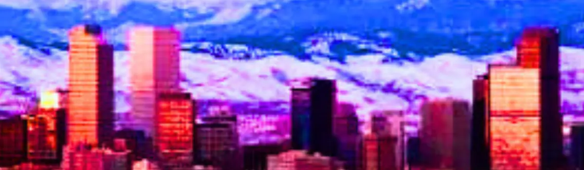 Distorted image of the Denver skyline with a section of the Rocky Mountains in the background.