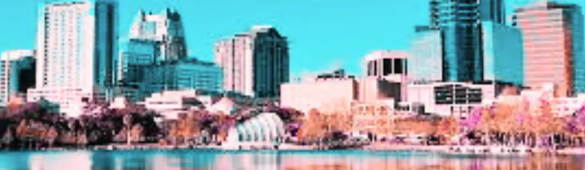 Distorted image of Orlando skyline with a blue tint.