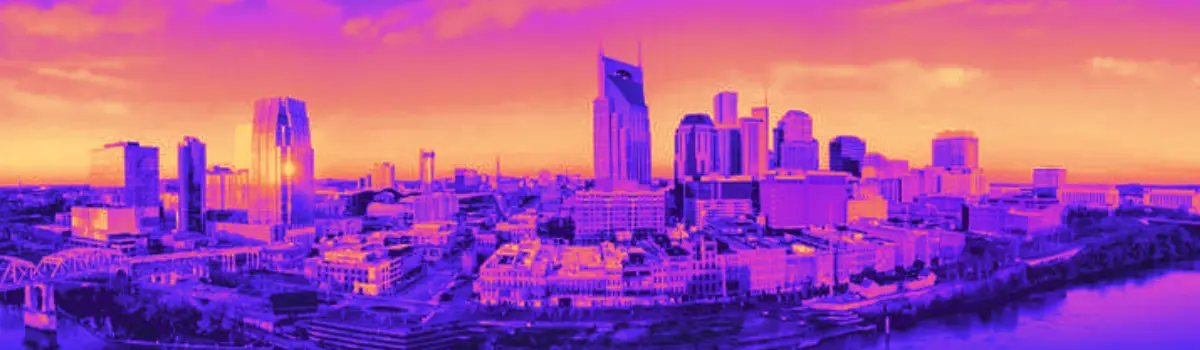 Distorted skyline of Nashville with orange and pink hues.