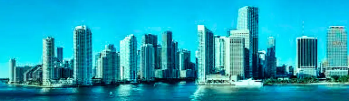 Distorted image of Miami skyline with turquoise hues.